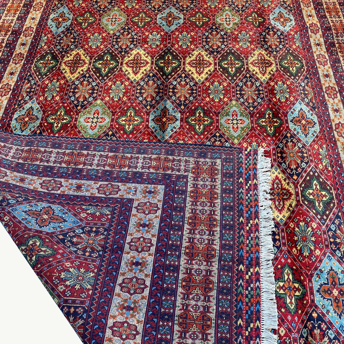 Handwoven Marinos Kashi Gul Rug with Vibrant Colors and Geometric Motifs