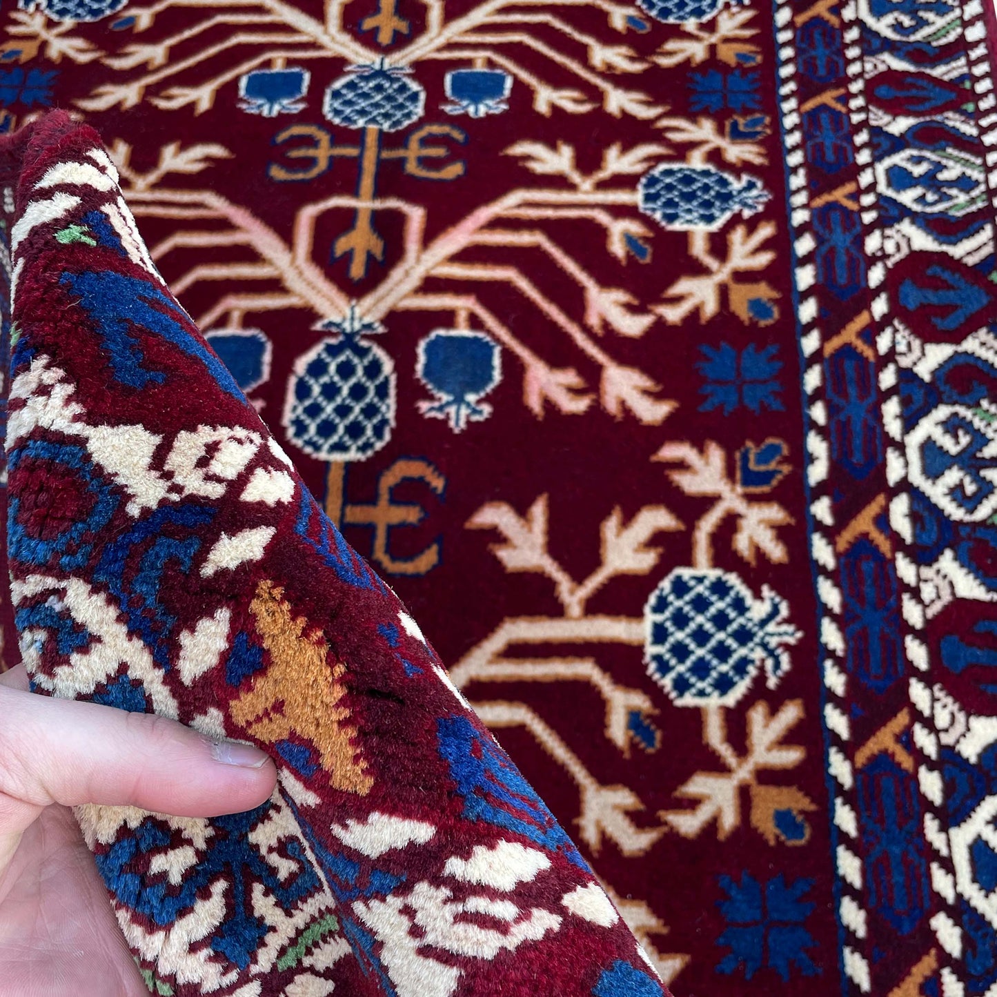 Marinos Anar Gul Rug – Afghan Craftsmanship in Deep Crimson with Symbolic Blossoms