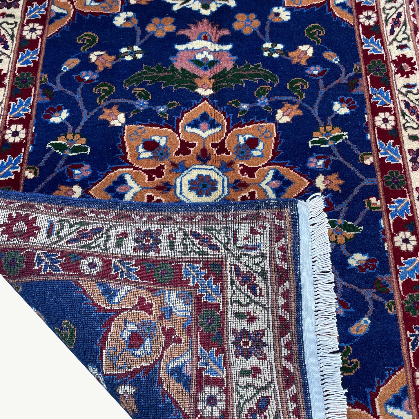 Handwoven Marinos Rug with Floral Motifs and Vibrant Colors