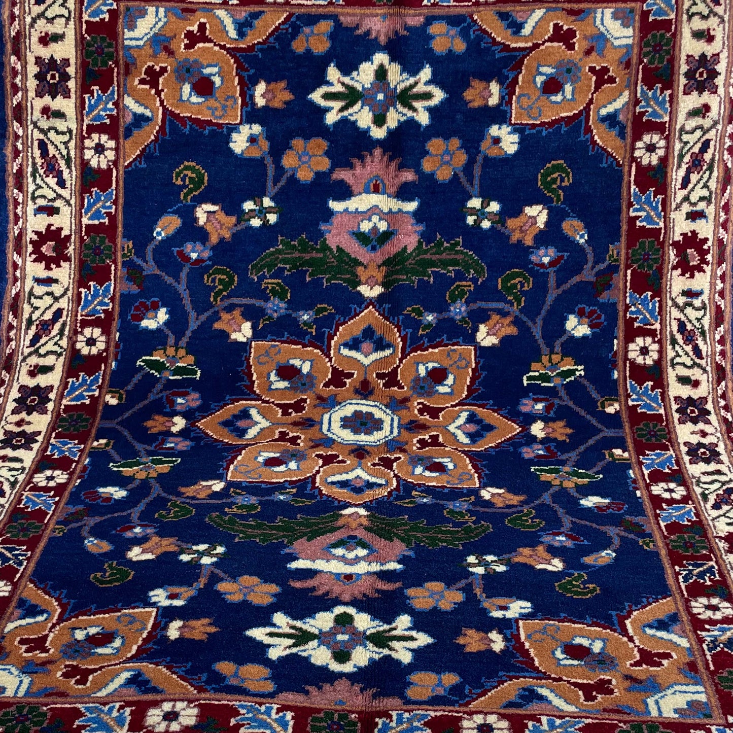 Handwoven Marinos Rug with Floral Motifs and Vibrant Colors