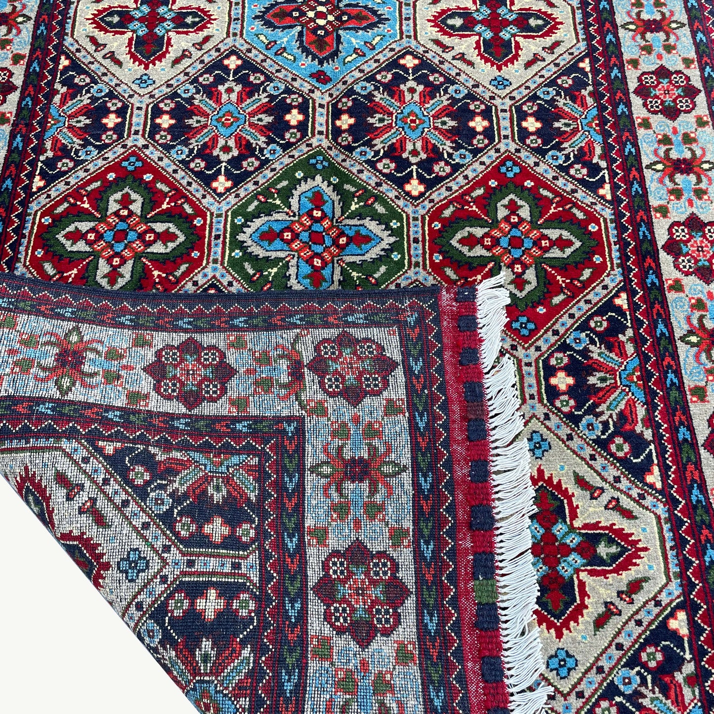 Handwoven Marinos Kashi Gul Rug with Vibrant Geometric Patterns