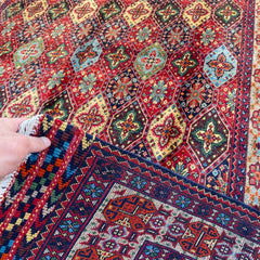 Handwoven Marinos Kashi Gul Rug with Vibrant Colors and Geometric Motifs