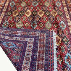 Handwoven Marinos Kashi Gul Rug with Vibrant Colors and Geometric Motifs