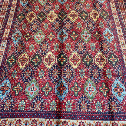 Handwoven Marinos Kashi Gul Rug with Vibrant Colors and Geometric Motifs