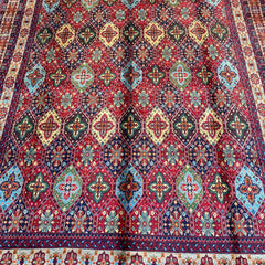 Handwoven Marinos Kashi Gul Rug with Vibrant Colors and Geometric Motifs