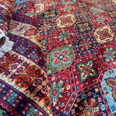 Handwoven Marinos Kashi Gul Rug with Vibrant Colors and Geometric Motifs