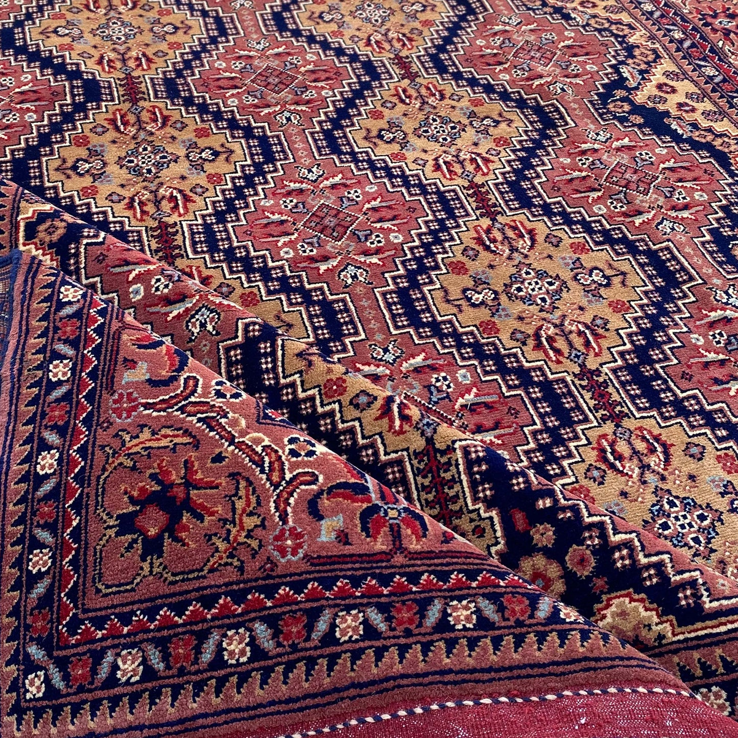 Marinos Yusof Bai Numa Rug – Grand Afghan Weave in Rhythmic Elegance