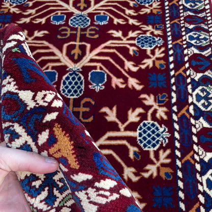 Marinos Anar Gul Rug – Afghan Craftsmanship in Deep Crimson with Symbolic Blossoms