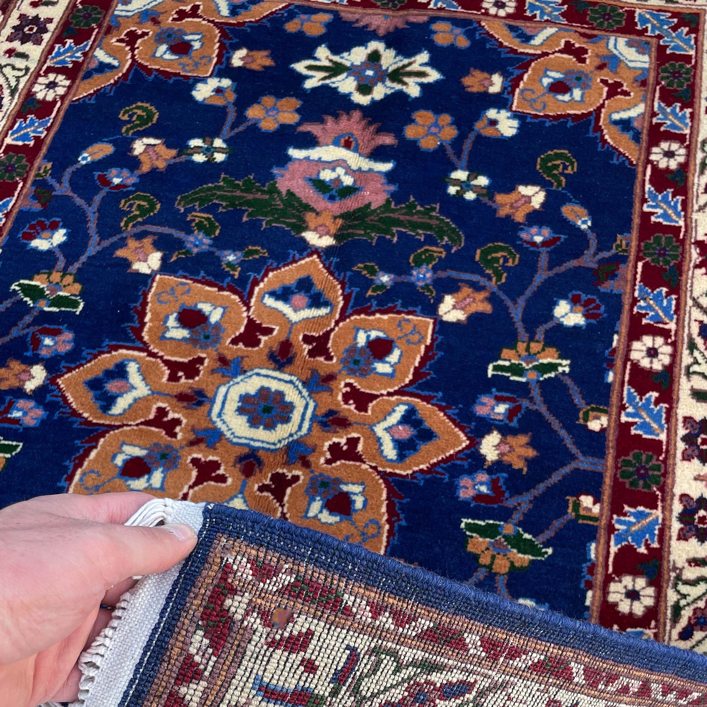 Handwoven Marinos Rug with Floral Motifs and Vibrant Colors