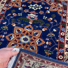 Handwoven Marinos Rug with Floral Motifs and Vibrant Colors