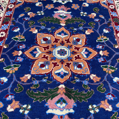 Handwoven Marinos Rug with Floral Motifs and Vibrant Colors