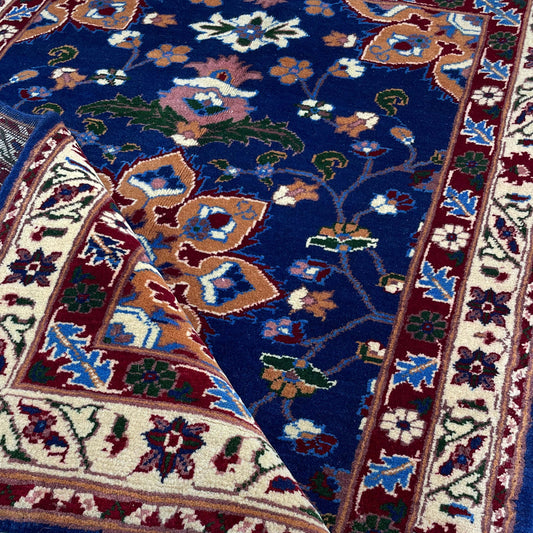 Handwoven Marinos Rug with Floral Motifs and Vibrant Colors