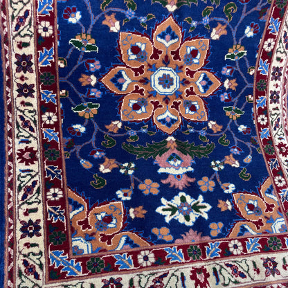 Handwoven Marinos Rug with Floral Motifs and Vibrant Colors
