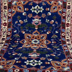Handwoven Marinos Rug with Floral Motifs and Vibrant Colors