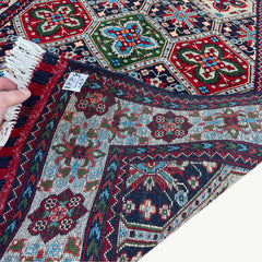 Handwoven Marinos Kashi Gul Rug with Vibrant Geometric Patterns