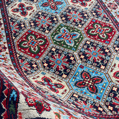 Handwoven Marinos Kashi Gul Rug with Vibrant Geometric Patterns