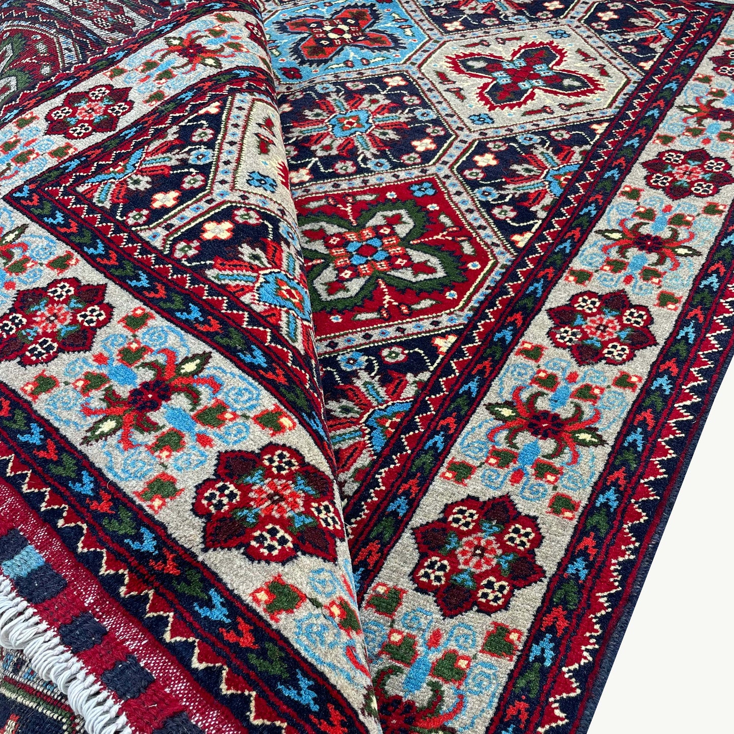 Handwoven Marinos Kashi Gul Rug with Vibrant Geometric Patterns