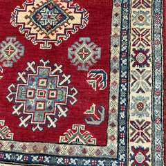 Crimson Afghan Kazak Rug – Hand-Knotted Tribal Medallions & Double Border