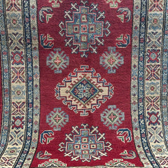 Crimson Afghan Kazak Rug – Hand-Knotted Tribal Medallions & Double Border