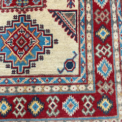 Ivory-Field Afghan Kazak Rug – Tribal Medallion Geometry
