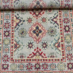 Grey-Field Afghan Kazak Rug – Medallion & Star Border Motifs