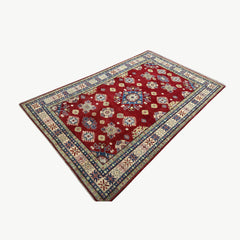 Hand-Knotted 10 x 6.4 Kazak Rug – Traditional Floral & Geometric Design