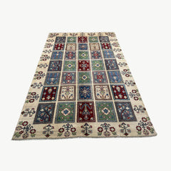 Afghan Kazak 10 x 6.6 Rug – Panel Design with Tribal Floral Motifs in Ivory, Red, Green & Blue