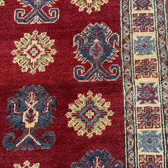Afghan Kazak 9.5 x 2.7 Runner Rug – Red Field with Repeating Tribal Medallions