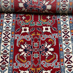 Afghan Kazak 9.5 x 2.5 Runner – Red Field with Tribal Medallion & Ram’s Horn Motifs