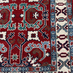 Afghan Kazak 9.7 x 2.6 Runner – Rich Red Field with Tribal Geometric Motifs