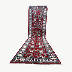 Afghan Kazak 9.7 x 2.6 Runner – Rich Red Field with Tribal Geometric Motifs