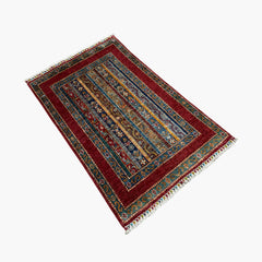 Shaal 4.1 x 2.6 Wool Rug – Crimson & Teal Striped Tribal Harmony