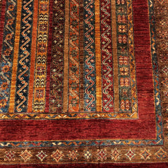 Shaal 7.7 x 5.6 Wool Rug – Tribal Chevron & Motif Stripes in Ruby & Earth Tones