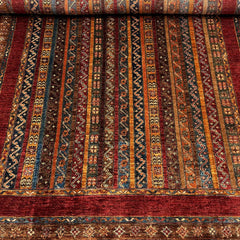 Shaal 7.7 x 5.6 Wool Rug – Tribal Chevron & Motif Stripes in Ruby & Earth Tones