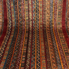 Shaal 7.7 x 5.6 Wool Rug – Tribal Chevron & Motif Stripes in Ruby & Earth Tones