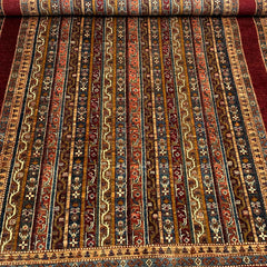 Shaal 9.7 x 6.6 Wool Rug – Tribal Stripe Symphony in Ruby & Earth Tones