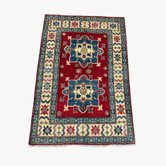 Afghan Kazak 3.9 x 2.6 Rug – Symmetrical Medallion & Tribal Border Design in Red, Blue, and Cream