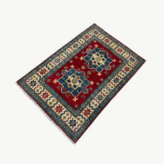 Afghan Kazak 3.9 x 2.6 Rug – Symmetrical Medallion & Tribal Border Design in Red, Blue, and Cream