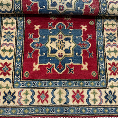 Afghan Kazak 3.9 x 2.6 Rug – Symmetrical Medallion & Tribal Border Design in Red, Blue, and Cream