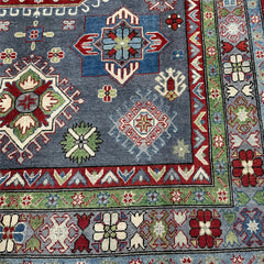 Afghan Kazak 9.7 x 6.6 Rug – Deep Red Field with Tribal Diamond Medallions